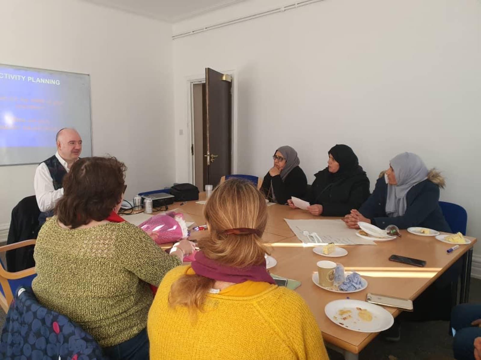 Women meeting together at a Women’s Voices session